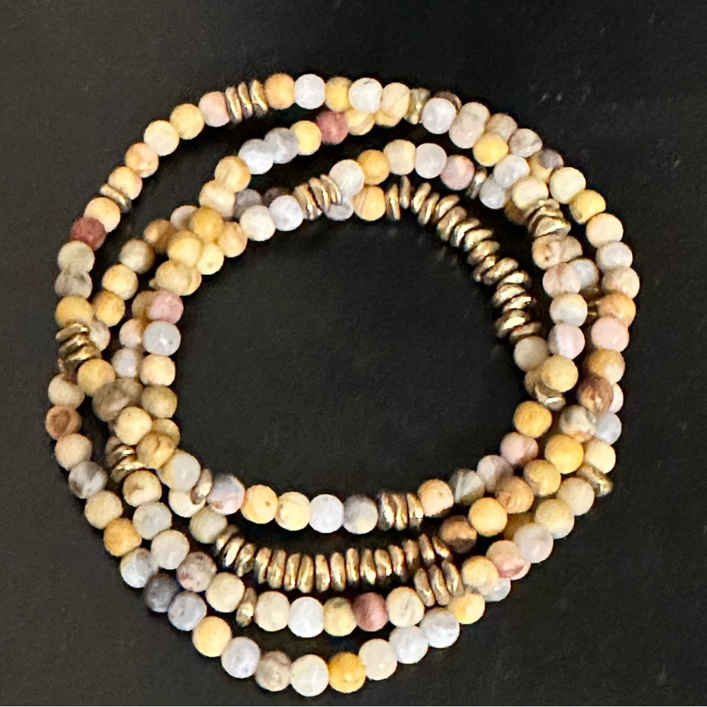 Tan and Gold Bracelets